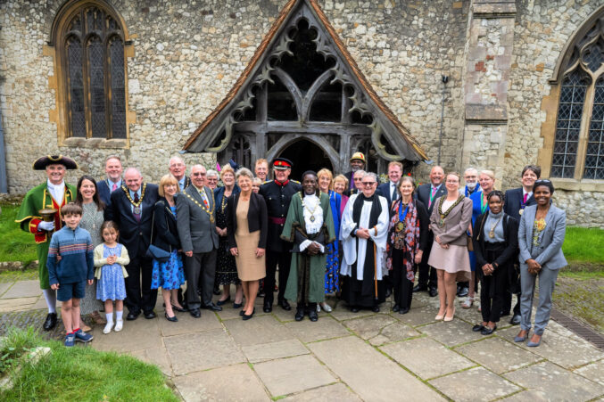 Group of people outside a church.