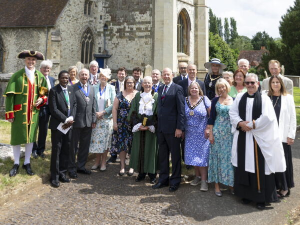 Group of people outside a church.