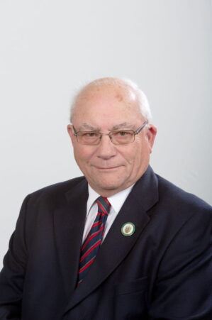 Head and shoulders of smiling male